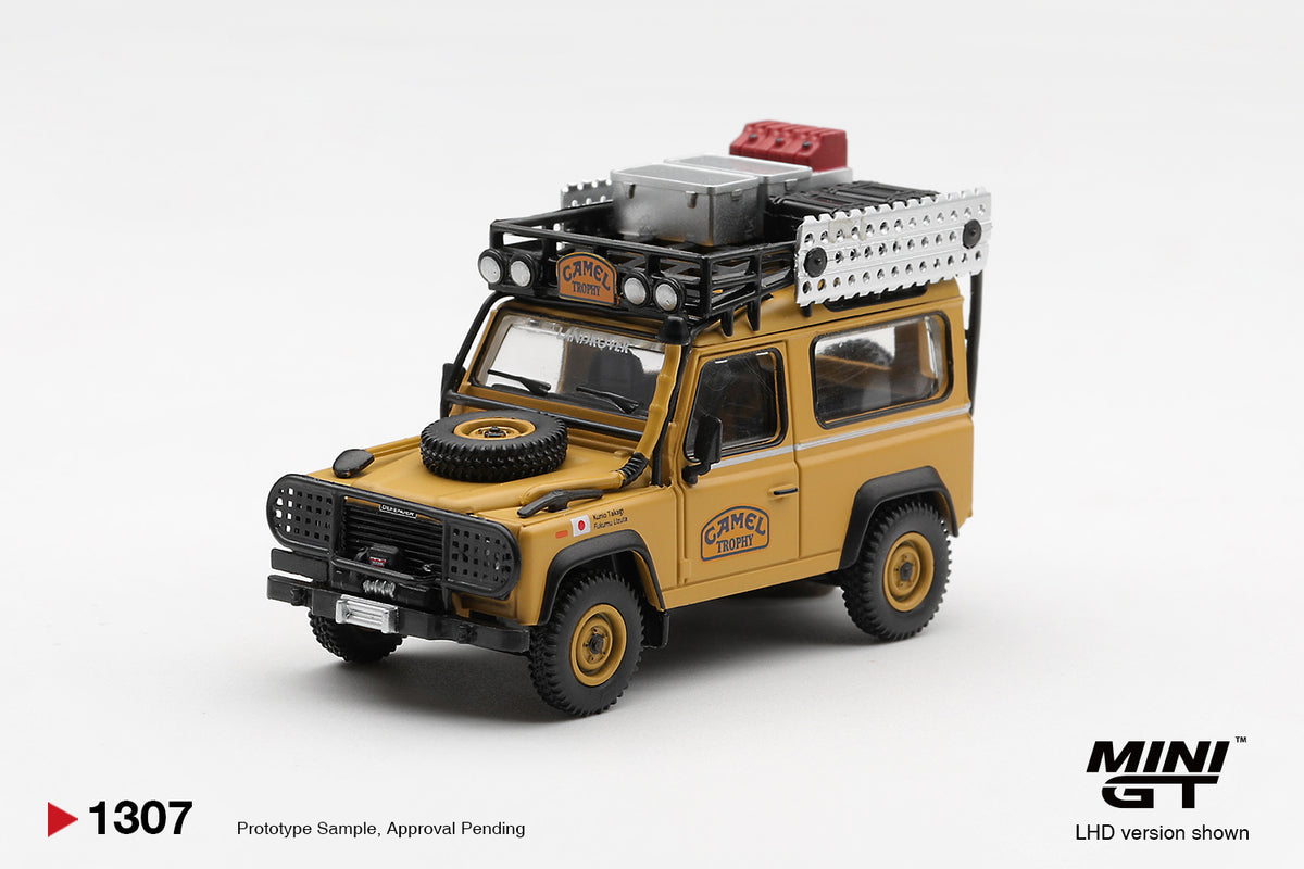 Mini GT 1:64 Diecast - LAND ROVER DEFENDER 90 1985 CAMEL TROPHY BORNEO TEAM JAPAN (LHD), Yellow - MGT01307-L