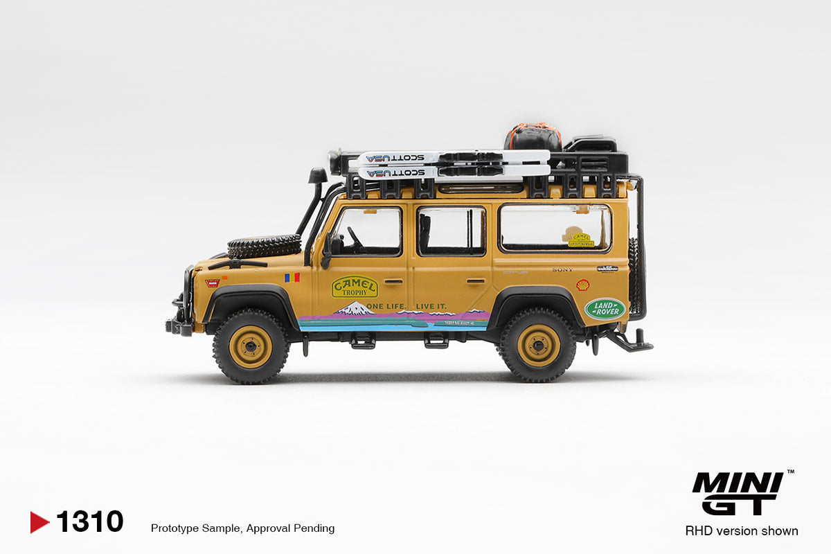 Mini GT 1:64 Diecast - LAND ROVER DEFENDER 110 1998 CAMEL TROPHY TIERRA DEL FUEGO CT.36 ROMANIA (RHD), Yellow - MGT01310-L