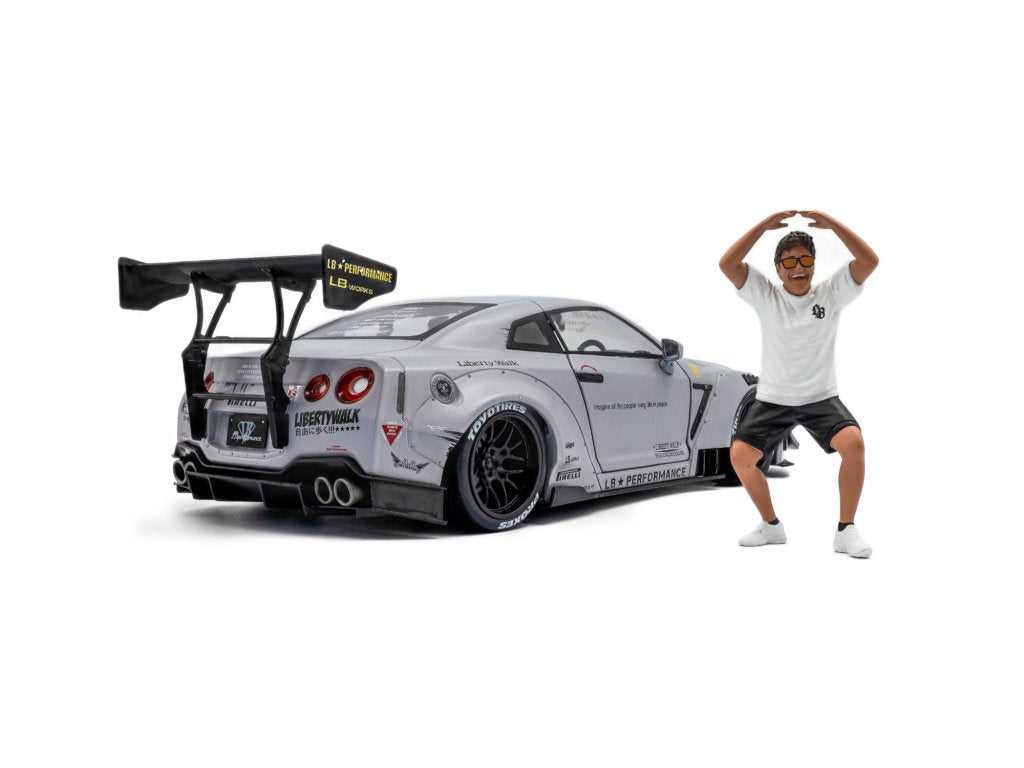 Solido 1:18 Diecast - 2024 Nissan GT-R (R35) w/Liberty Walk Body Kit Type 2.0 with Kato Figure, Grey - S1805821