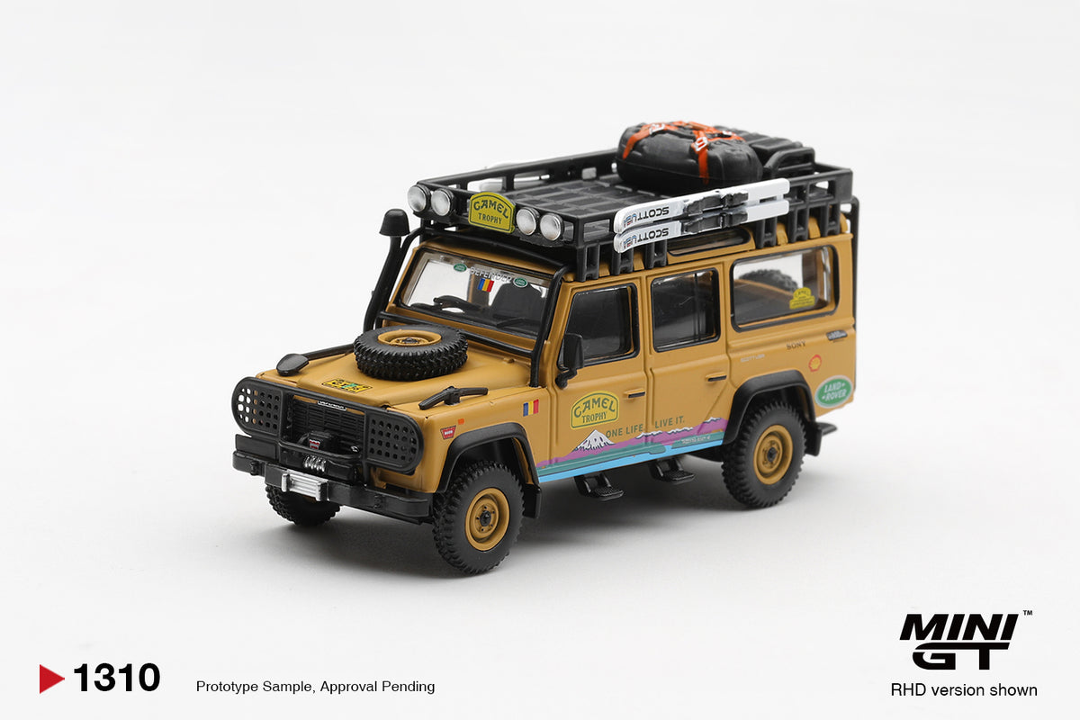 Mini GT 1:64 Diecast - LAND ROVER DEFENDER 110 1998 CAMEL TROPHY TIERRA DEL FUEGO CT.36 ROMANIA (RHD), Yellow - MGT01310-L