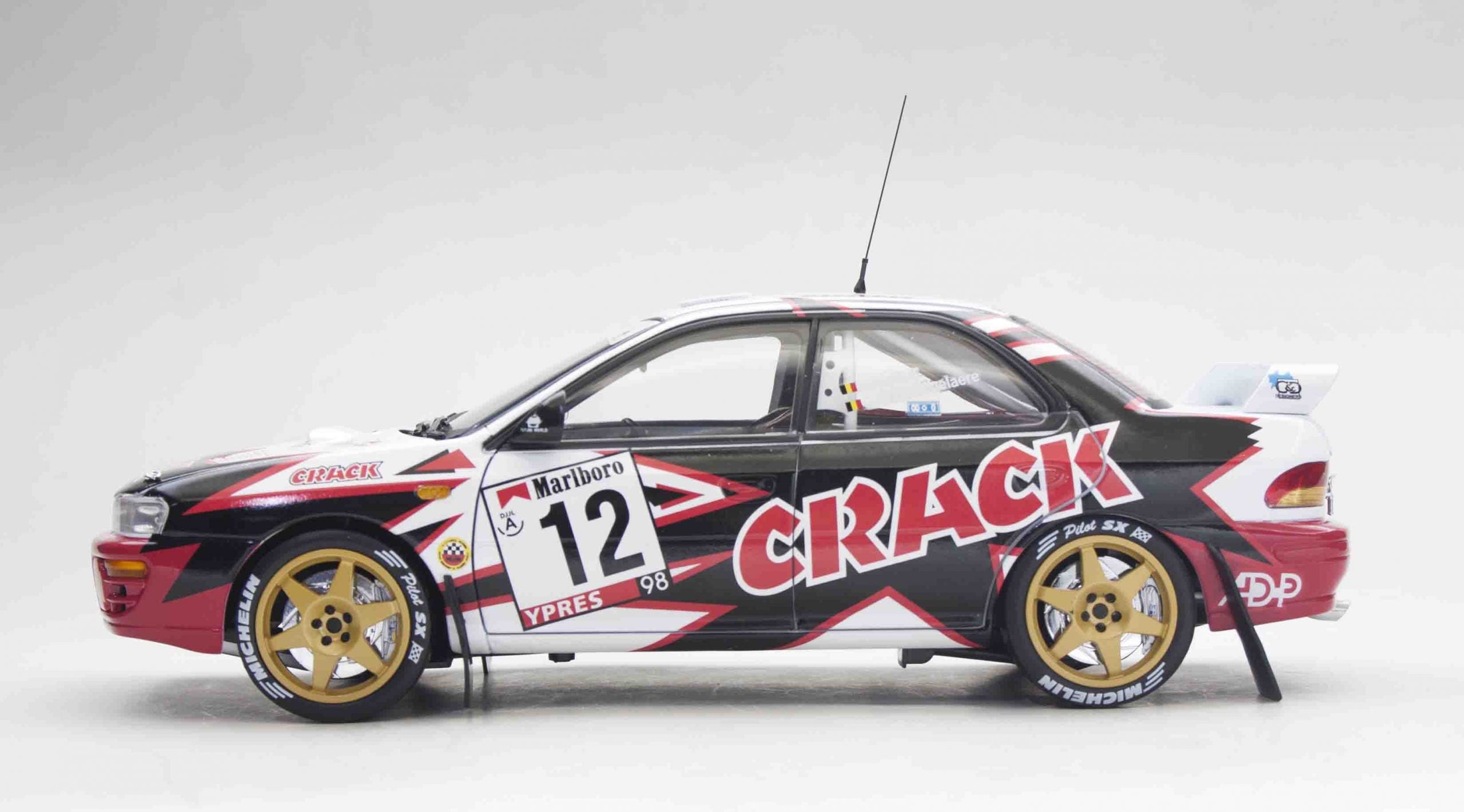Sunstar 1:18 Scale Diecast 5515 Subaru Impreza 555 #12 Belgium Crack Rally 1998