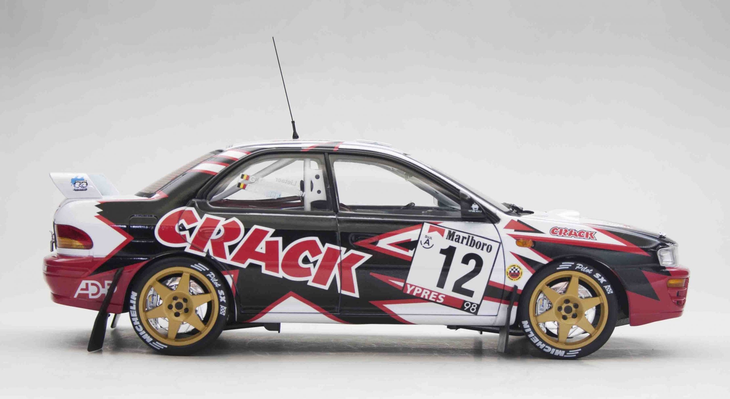 Sunstar 1:18 Scale Diecast 5515 Subaru Impreza 555 #12 Belgium Crack Rally 1998