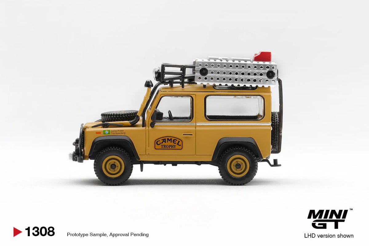 Mini GT 1:64 Diecast - LAND ROVER DEFENDER 90 1985 CAMEL TROPHY BORNEO TEAM BRAZIL (LHD), Yellow - MGT01308-L