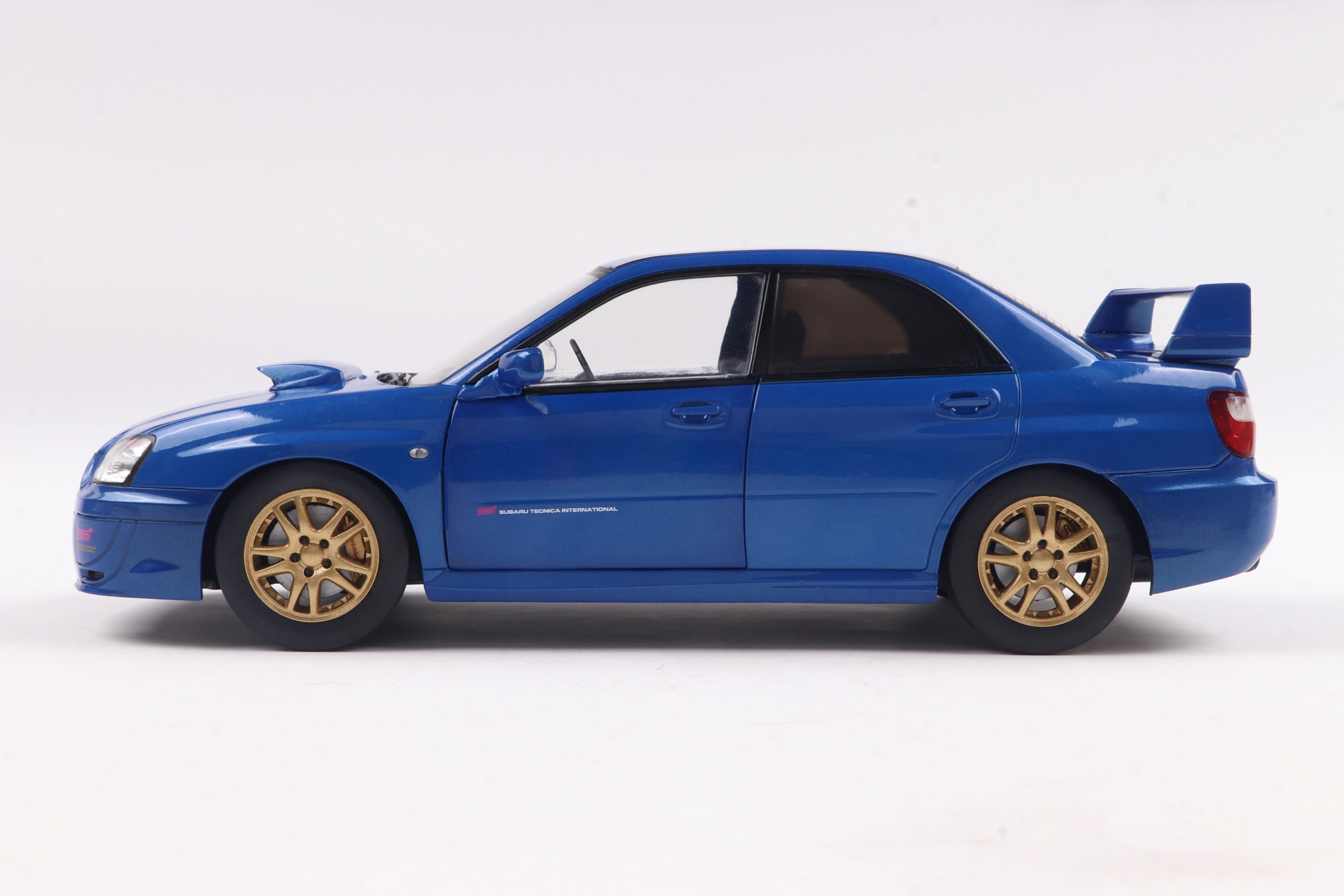 Solido 1:18 Diecast - 2003 Subaru Impreza WRX STI, Sonic Blue - S1812301