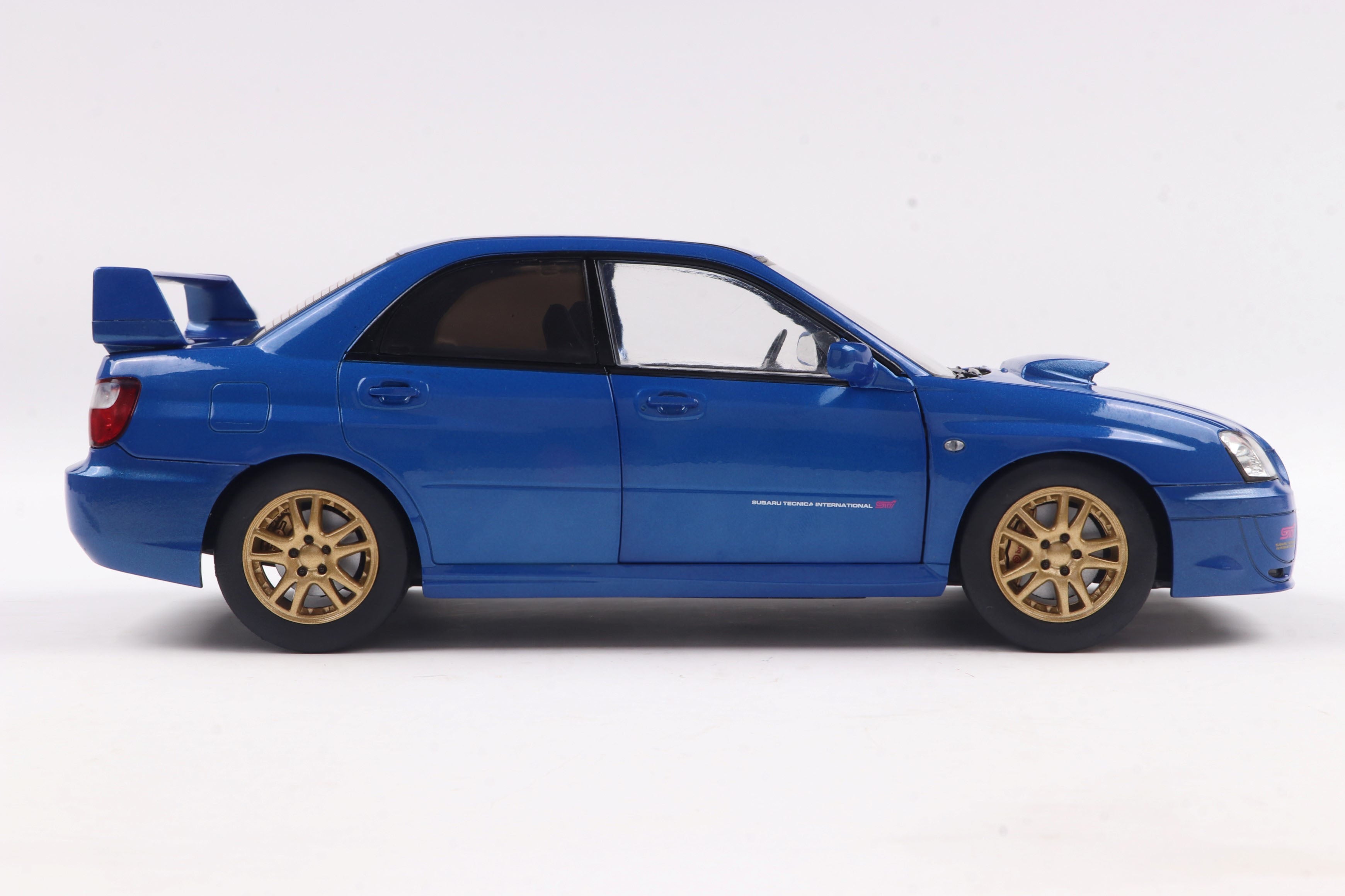 Solido 1:18 Diecast - 2003 Subaru Impreza WRX STI, Sonic Blue - S1812301