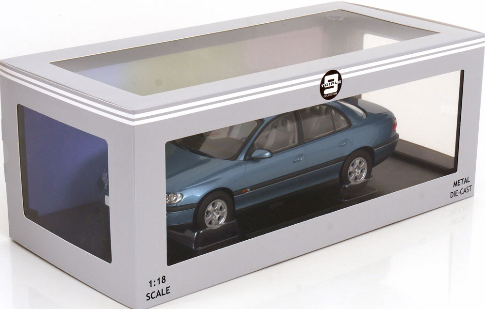 Triple 9 - 1:18 Scale Diecast - 1996 Opel Omega B CD, Polar Blue Metallic - T9-1800431