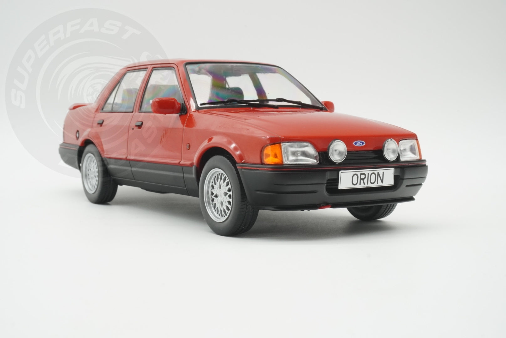 MCG 1:18 Scale Diecast - Ford Orion Mk II 1600E LHD with Multispoke Alloys, Red - MCG18488