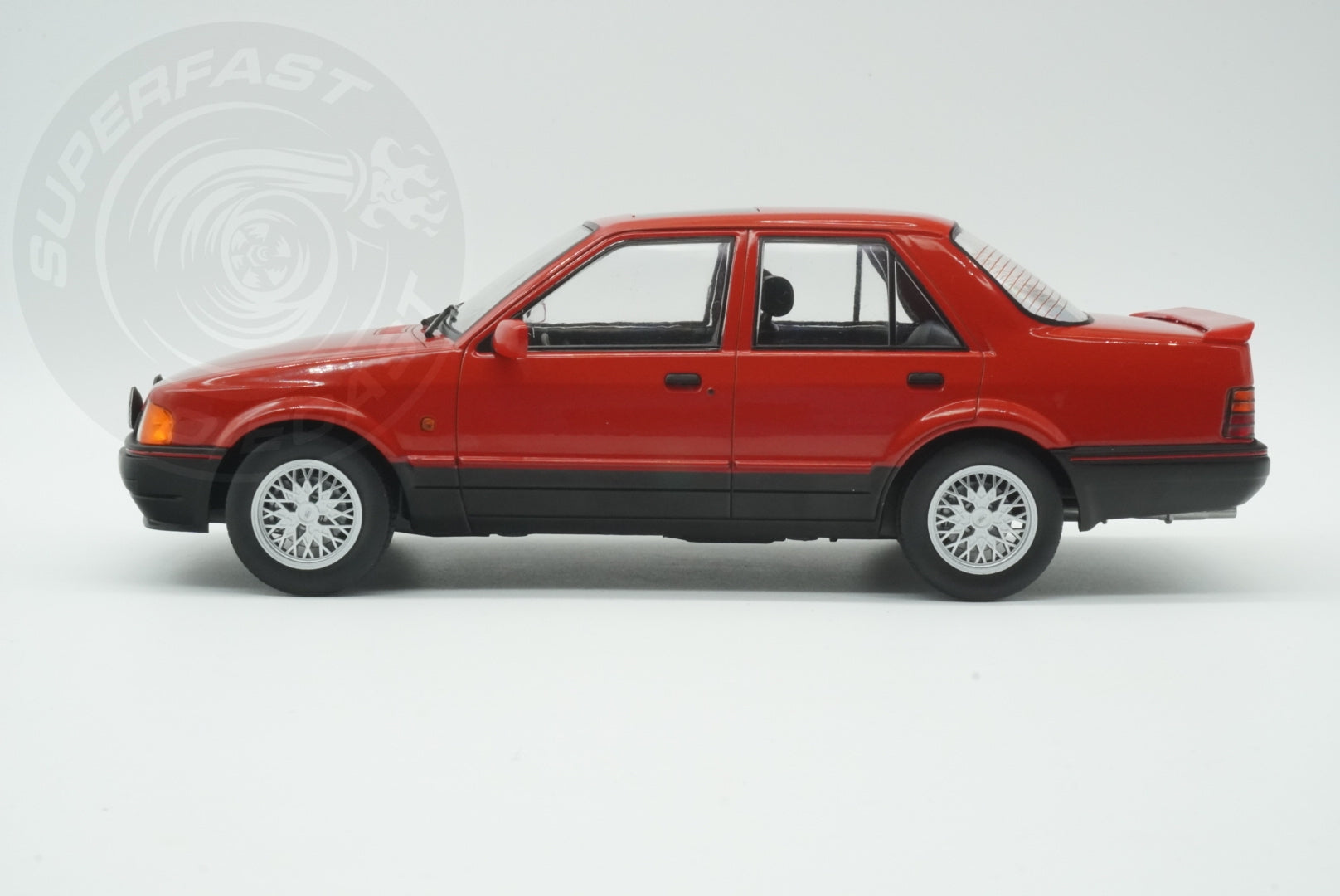 MCG 1:18 Scale Diecast - Ford Orion Mk II 1600E LHD with Multispoke Alloys, Red - MCG18488