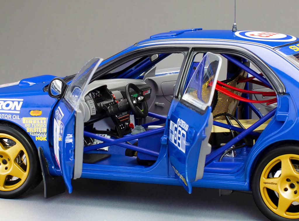 Sunstar Diecast - 1:18 Subaru Impreza 555 - #1 Colin McRae - Winner Memorial Bettega 1993 - 5600