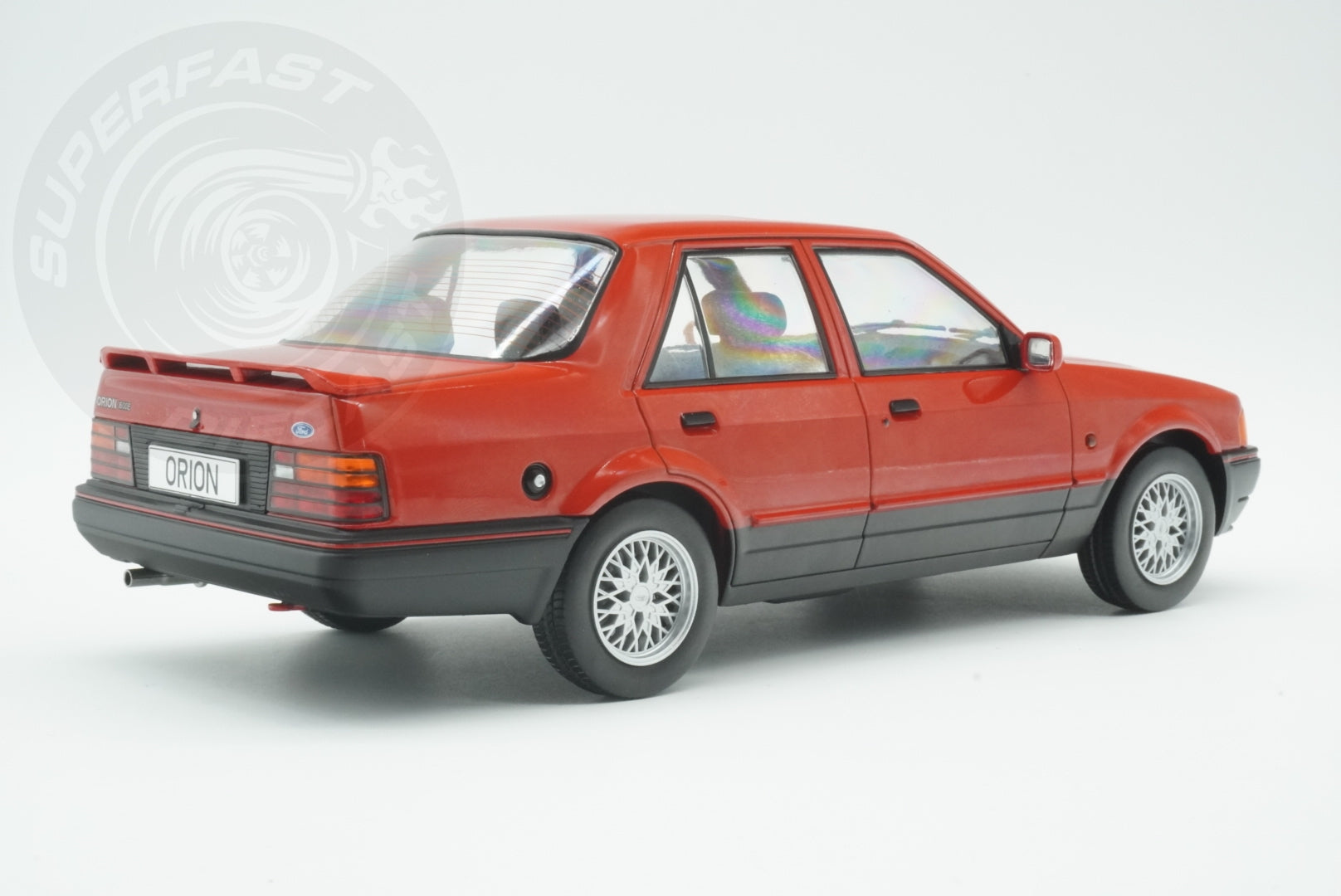 MCG 1:18 Scale Diecast - Ford Orion Mk II 1600E LHD with Multispoke Alloys, Red - MCG18488