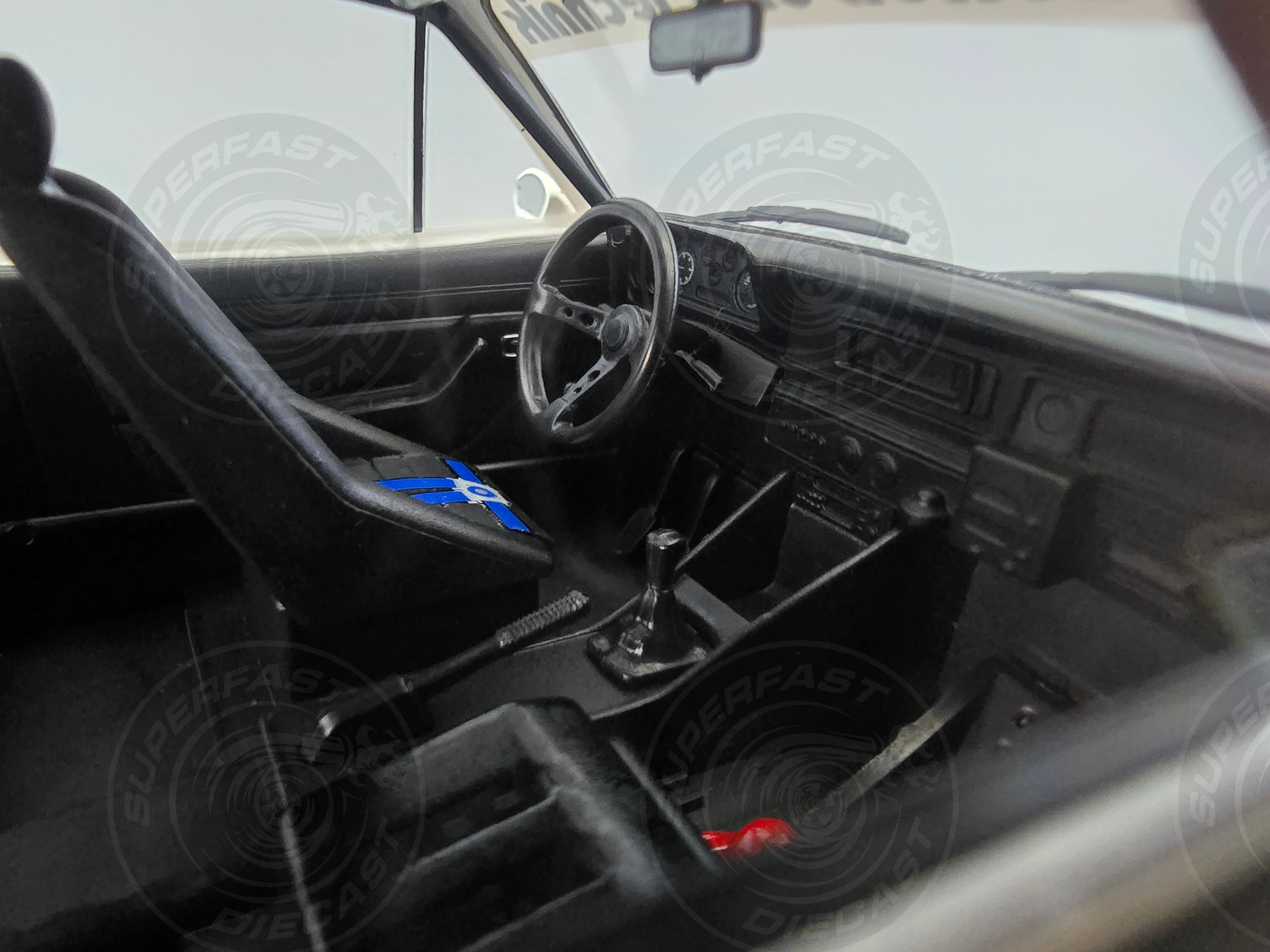 MCG 1:18 Scale Diecast Ford Escort MK II RS 2000, 24h Nürburgring, 1982, Sinzigar Mineralbrunnen, #59 - MCG18438R