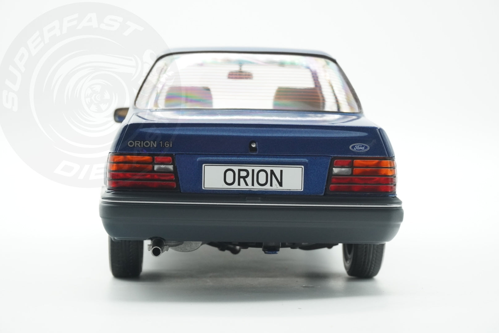 MCG 1:18 Scale Diecast - Ford Orion Mk II Basic Version LHD with Hub Caps, Blue - MCG18490