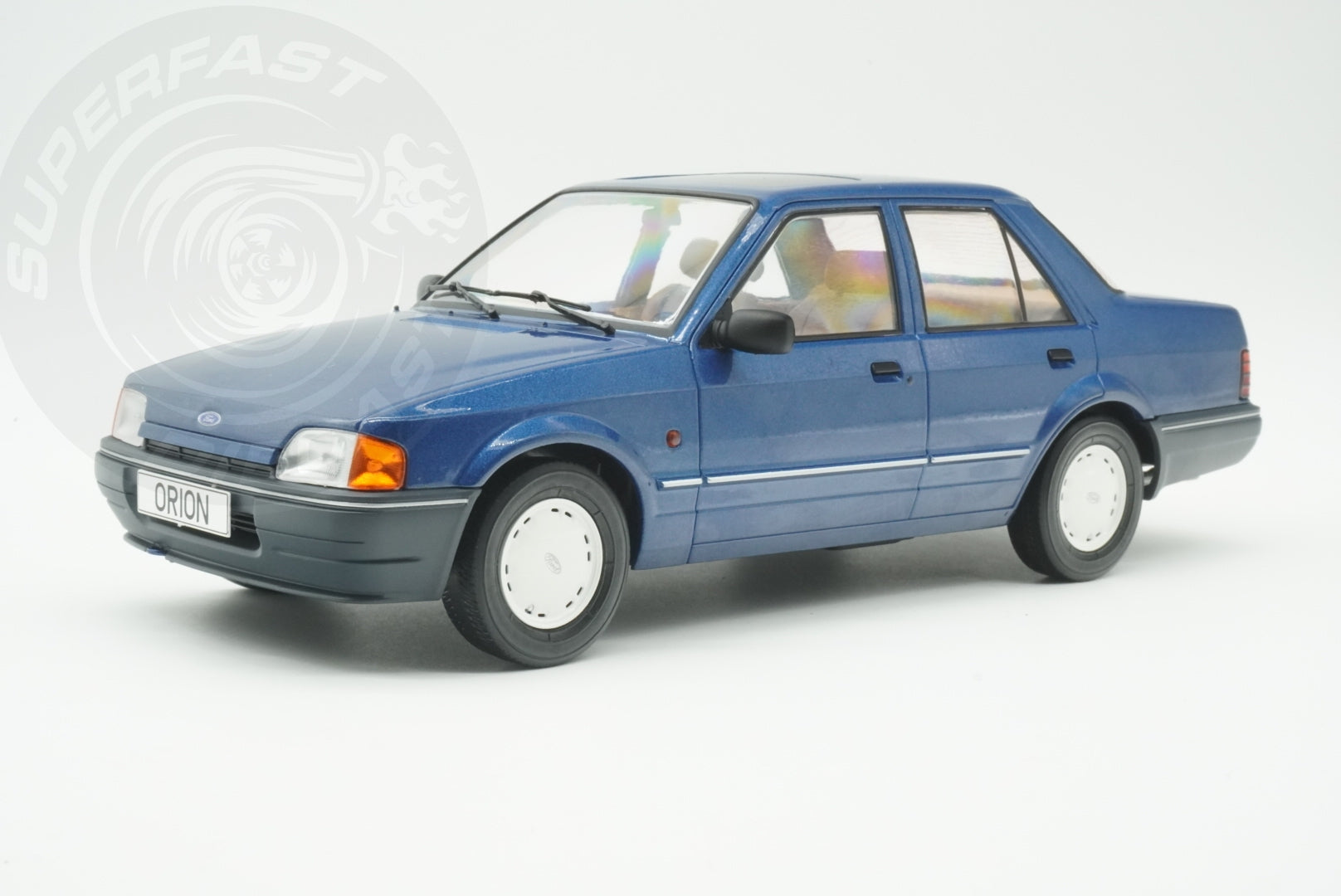 MCG 1:18 Scale Diecast - Ford Orion Mk II Basic Version LHD with Hub Caps, Blue - MCG18490