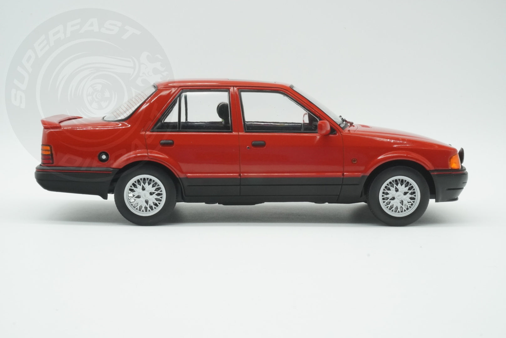 MCG 1:18 Scale Diecast - Ford Orion Mk II 1600E LHD with Multispoke Alloys, Red - MCG18488