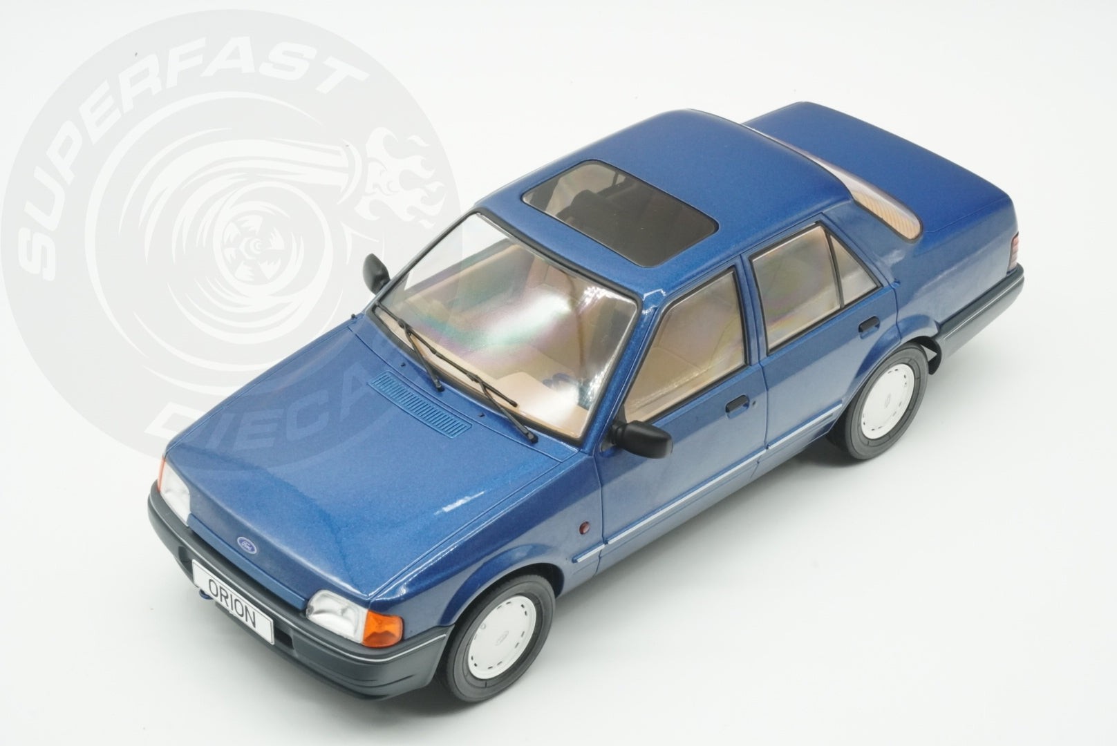 MCG 1:18 Scale Diecast - Ford Orion Mk II Basic Version LHD with Hub Caps, Blue - MCG18490