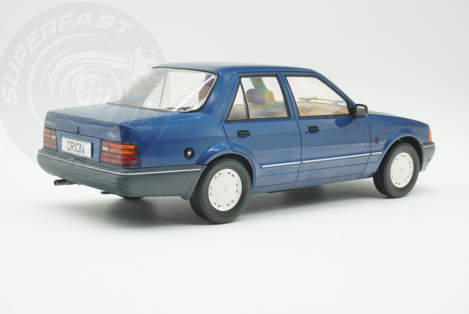 MCG 1:18 Scale Diecast - Ford Orion Mk II Basic Version LHD with Hub Caps, Blue - MCG18490