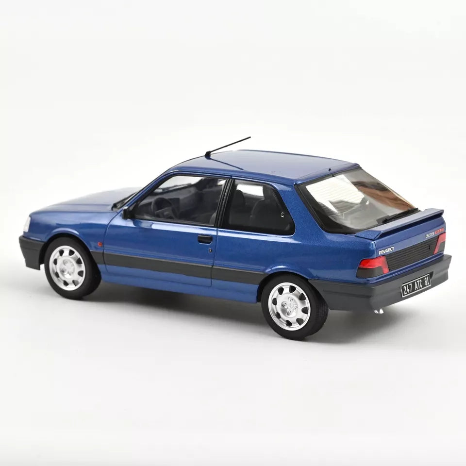 NoRev 1:18 Scale Diecast, 1991 Peugeot 309 GTi 16 in Miami Blue - 184881
