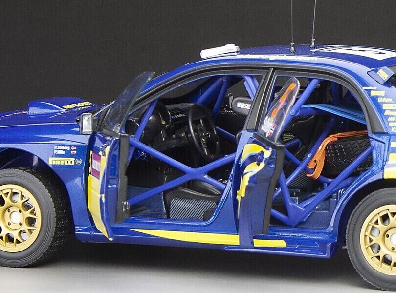 Sunstar 1:18 Subaru Impreza WRC06 #5 Solberg/Mills Wales Rally GB 2006 - 5580