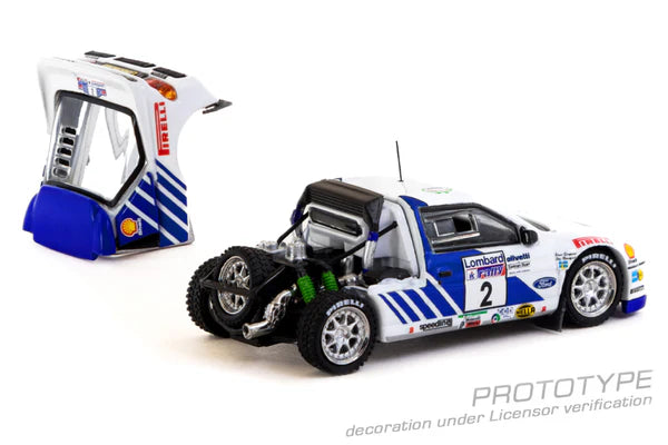 TARMAC WORKS 1:64 - 1986 Ford RS200 Lombard RAC Rally #2 Stig Blomqvist/Bruno Berglund, white/blue -