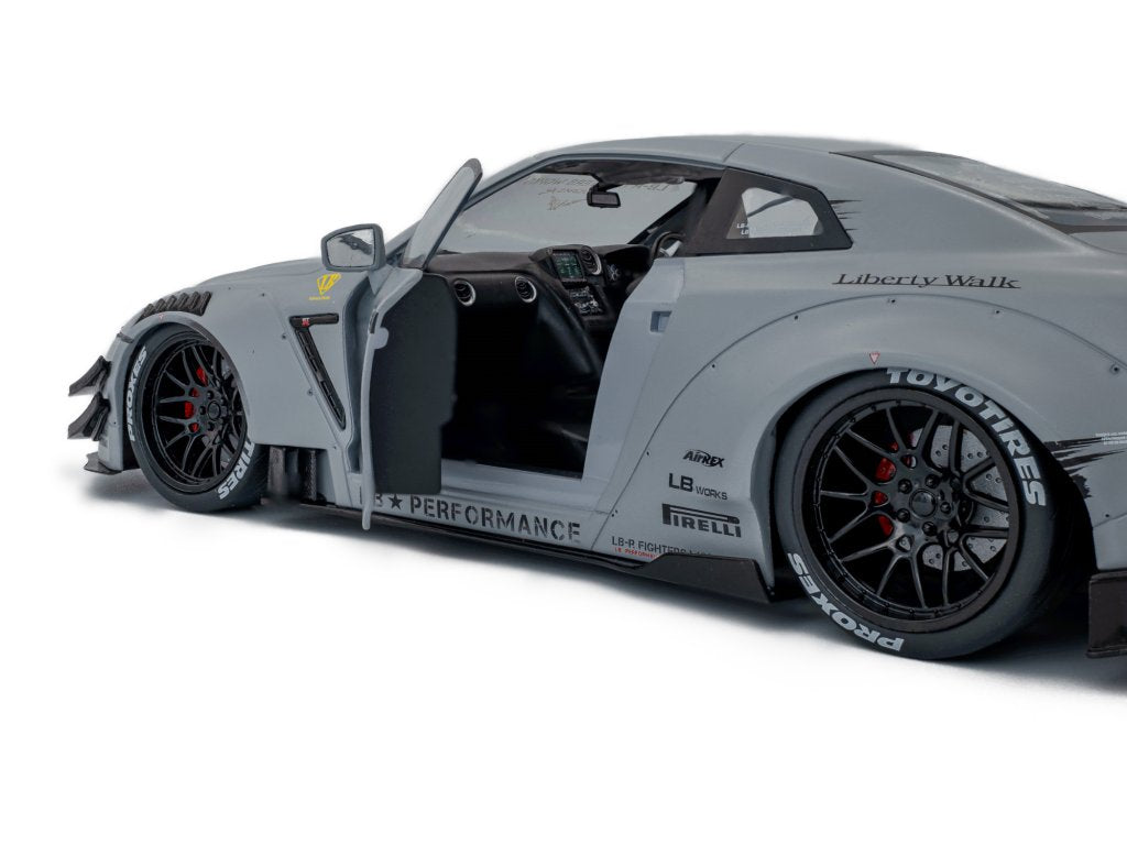 Solido 1:18 Diecast - 2024 Nissan GT-R (R35) w/Liberty Walk Body Kit Type 2.0 with Kato Figure, Grey - S1805821