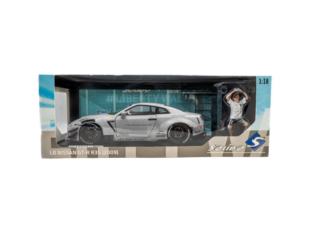 Solido 1:18 Diecast - 2024 Nissan GT-R (R35) w/Liberty Walk Body Kit Type 2.0 with Kato Figure, Grey - S1805821