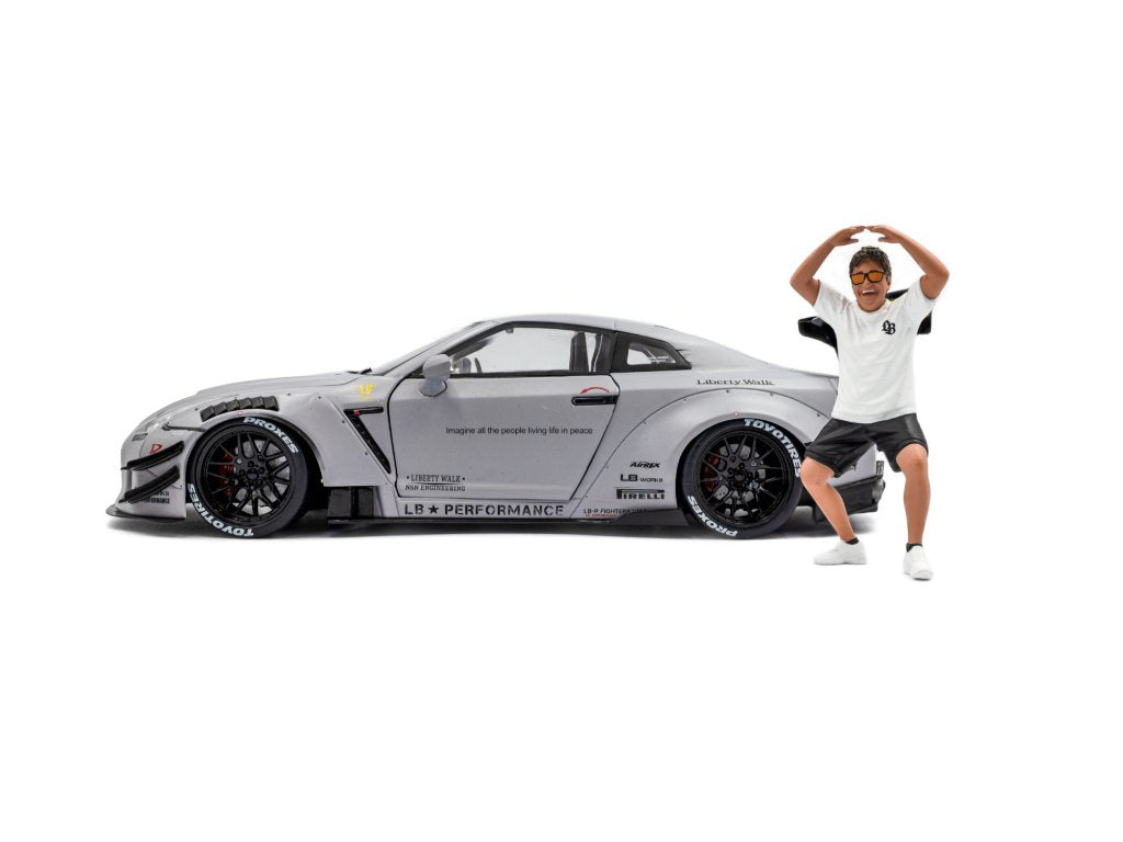 Solido 1:18 Diecast - 2024 Nissan GT-R (R35) w/Liberty Walk Body Kit Type 2.0 with Kato Figure, Grey - S1805821
