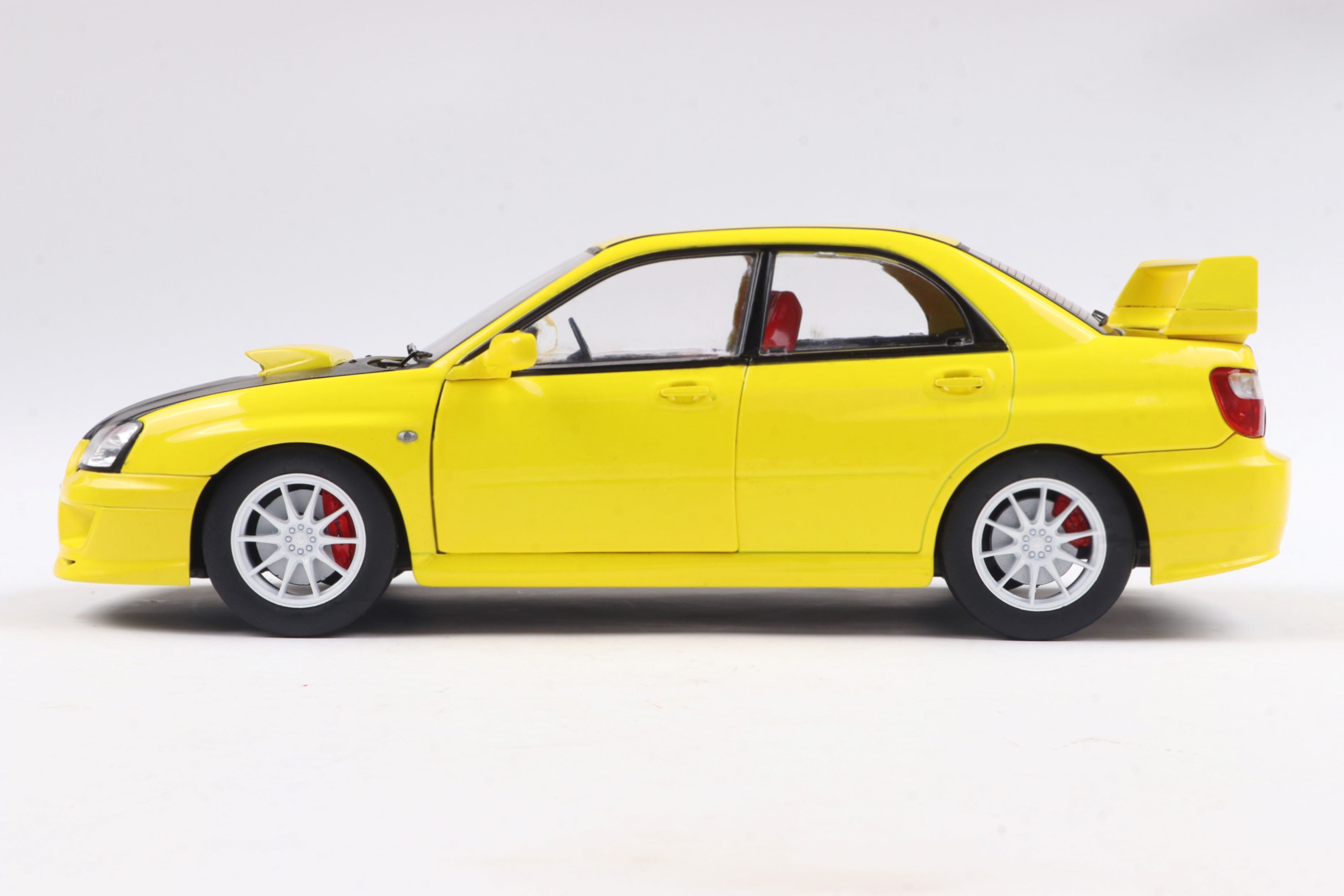 Solido 1:18 Diecast - 2003 Subaru Impreza WRX STI, Streetfighters Yellow - S1812302