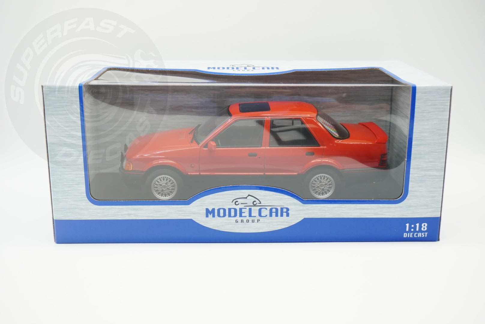 MCG 1:18 Scale Diecast - Ford Orion Mk II 1600E LHD with Multispoke Alloys, Red - MCG18488