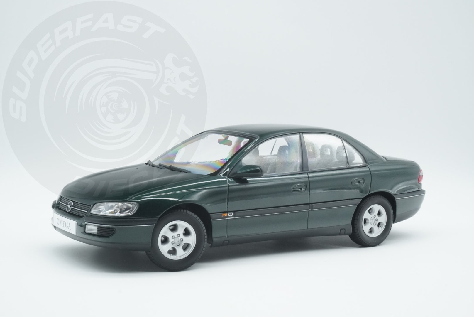 Triple 9 -  1:18 Scale Diecast - 1996 Opel Omega B CD, Jungle Green - T9-1800433