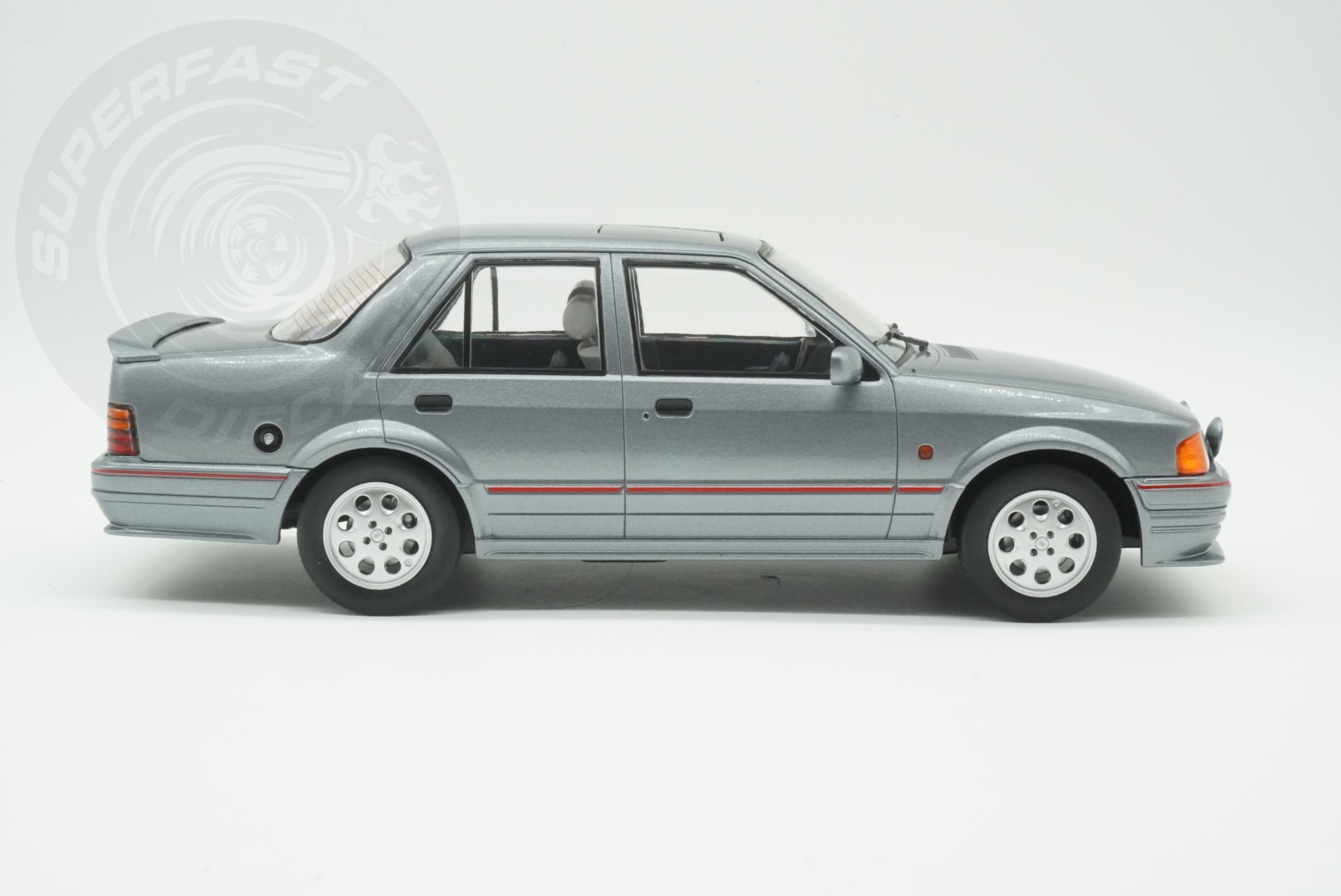 MCG 1:18 Scale Diecast - Ford Orion Mk II LHD with RS Bodykit, Grey - MCG18489