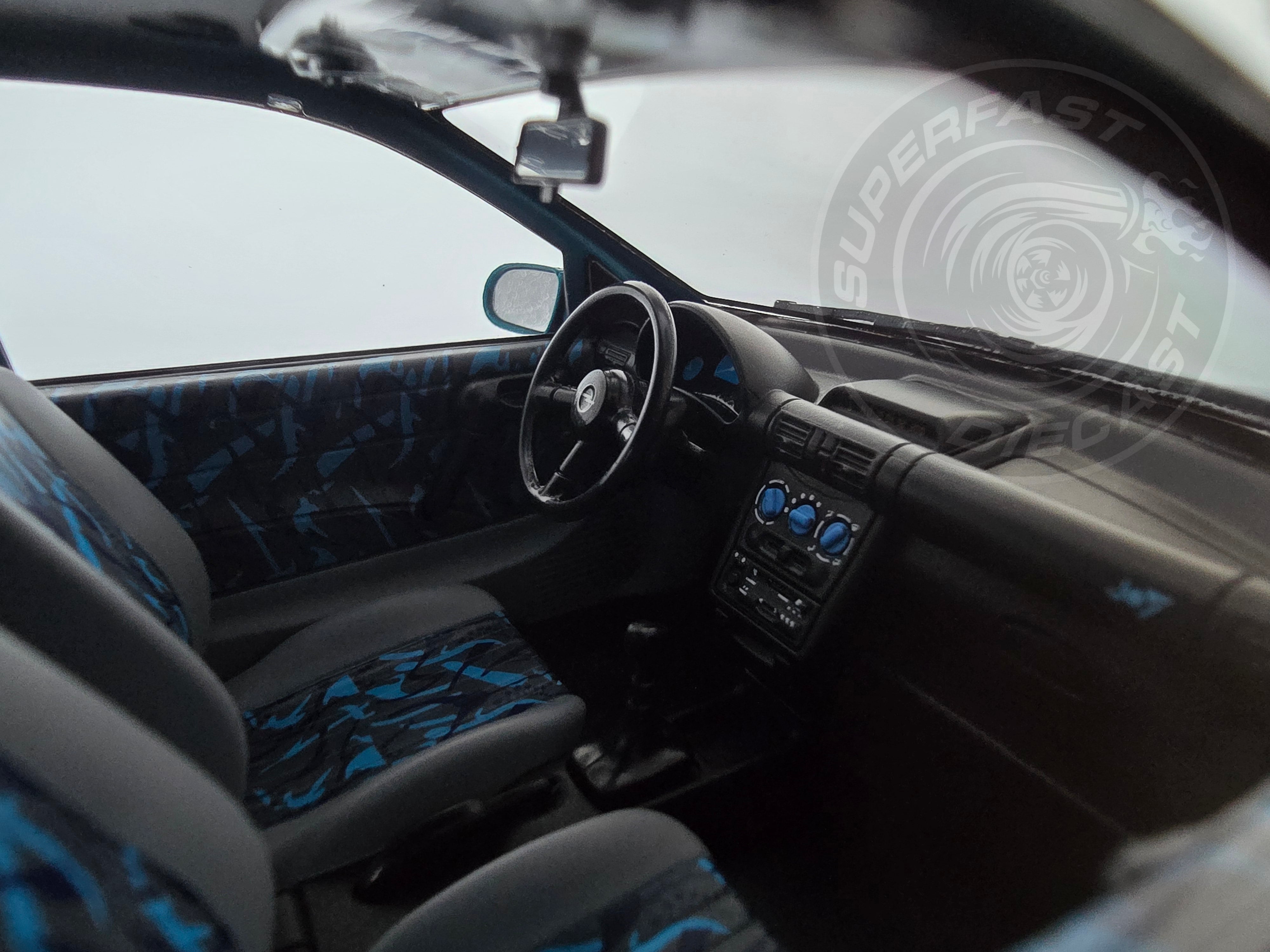 MCG 1:18 Scale Diecast - 1993 Opel Corsa B, Metallic Turquoise - MCG18514