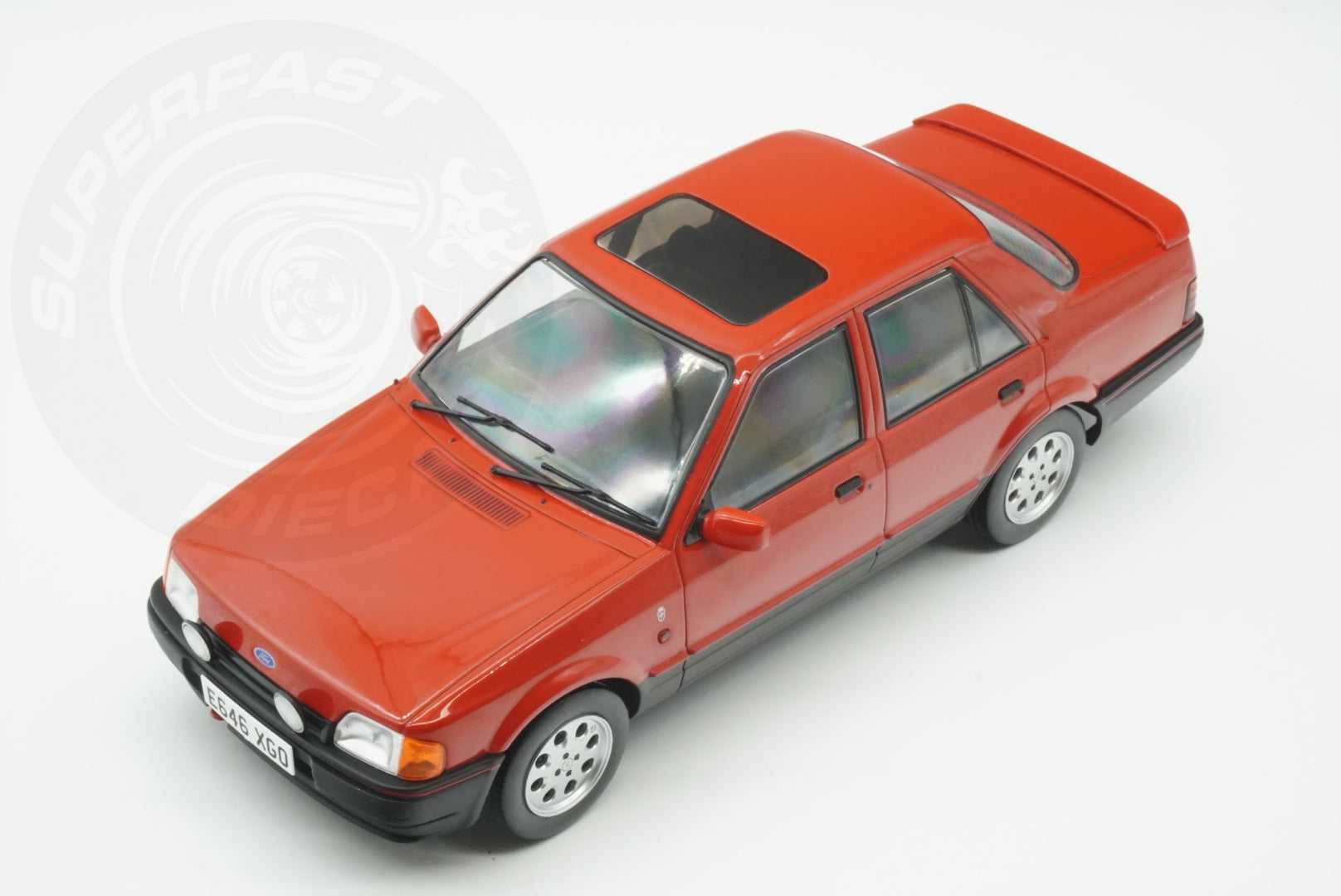 MCG 1:18 Scale Diecast - Ford Orion Mk II 1600i Ghia RHD with Pepperpot Alloys, Red (UK Exclusive 500pcs) - MCG18647