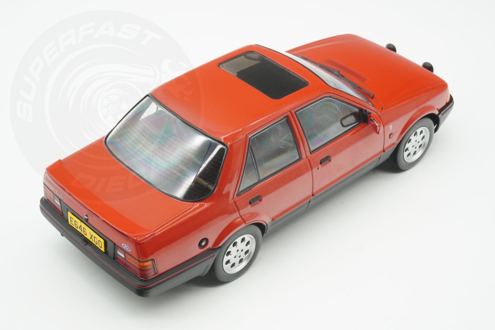 MCG 1:18 Scale Diecast - Ford Orion Mk II 1600i Ghia RHD with Pepperpot Alloys, Red (UK Exclusive 500pcs) - MCG18647