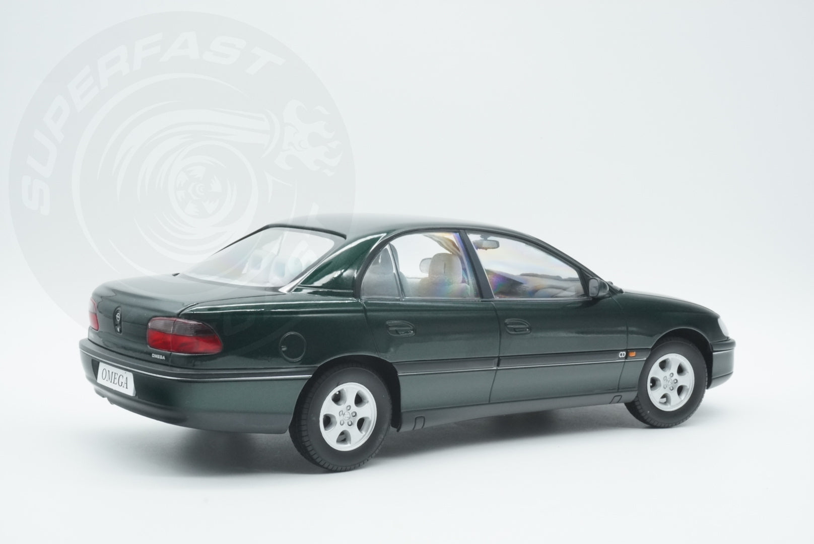 Triple 9 -  1:18 Scale Diecast - 1996 Opel Omega B CD, Jungle Green - T9-1800433