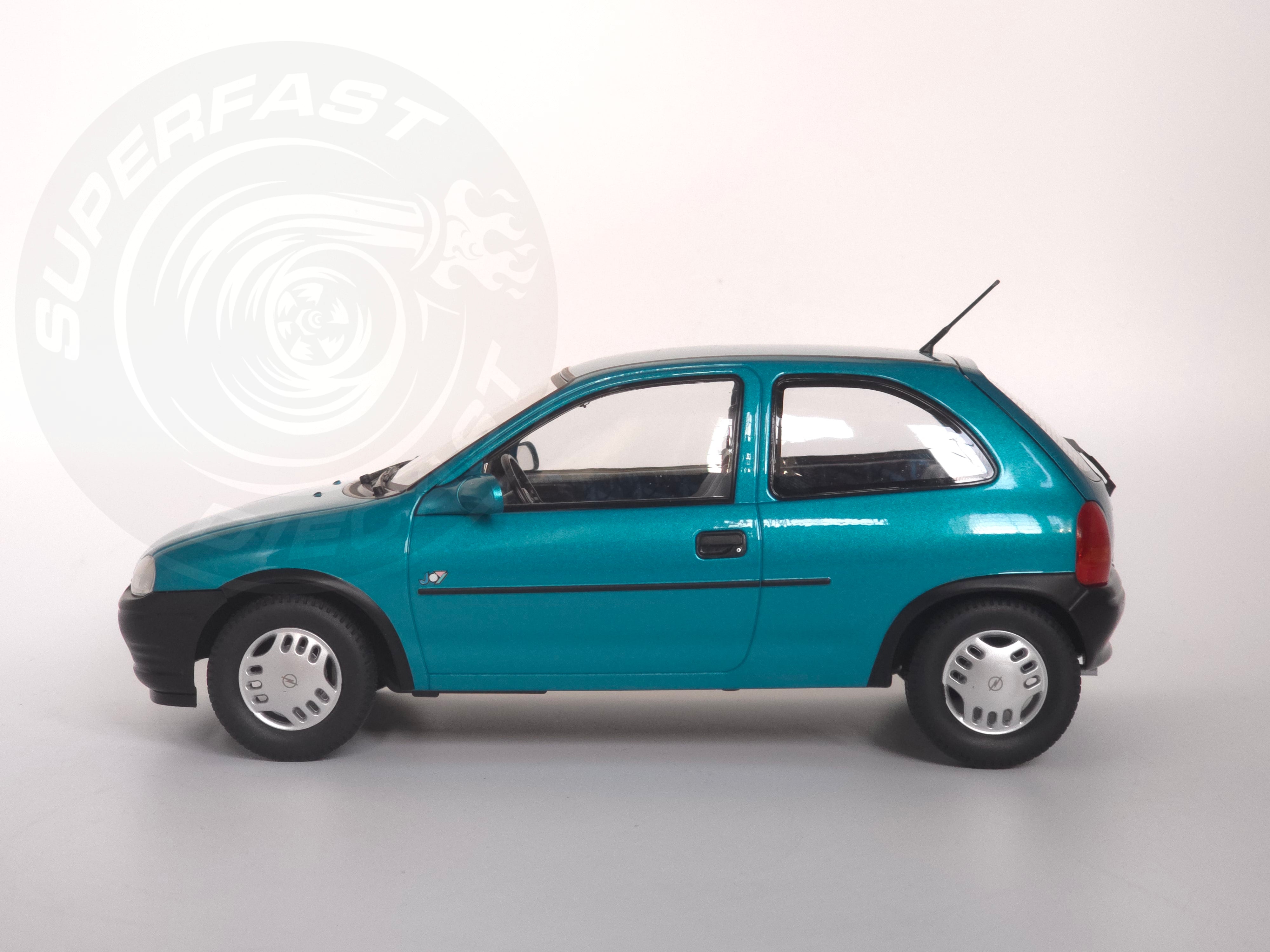 MCG 1:18 Scale Diecast - 1993 Opel Corsa B, Metallic Turquoise - MCG18