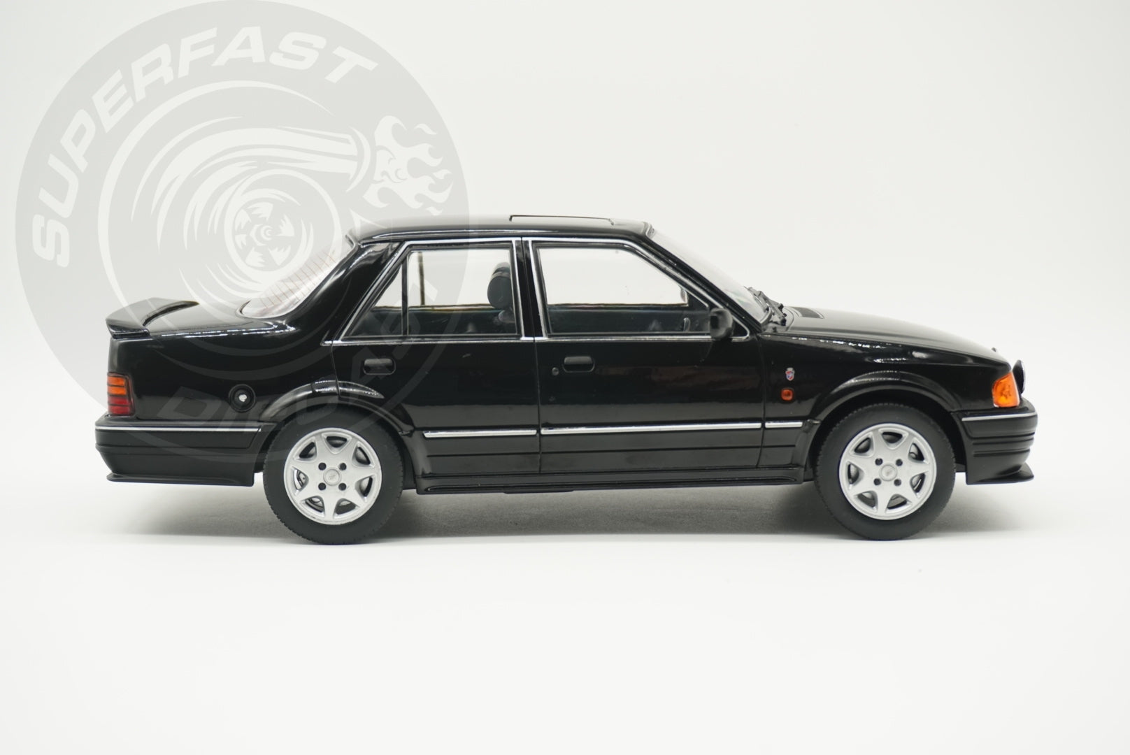 MCG 1:18 Scale Diecast - Ford Orion Mk II RHD with RS Bodykit, Black - MCG18649