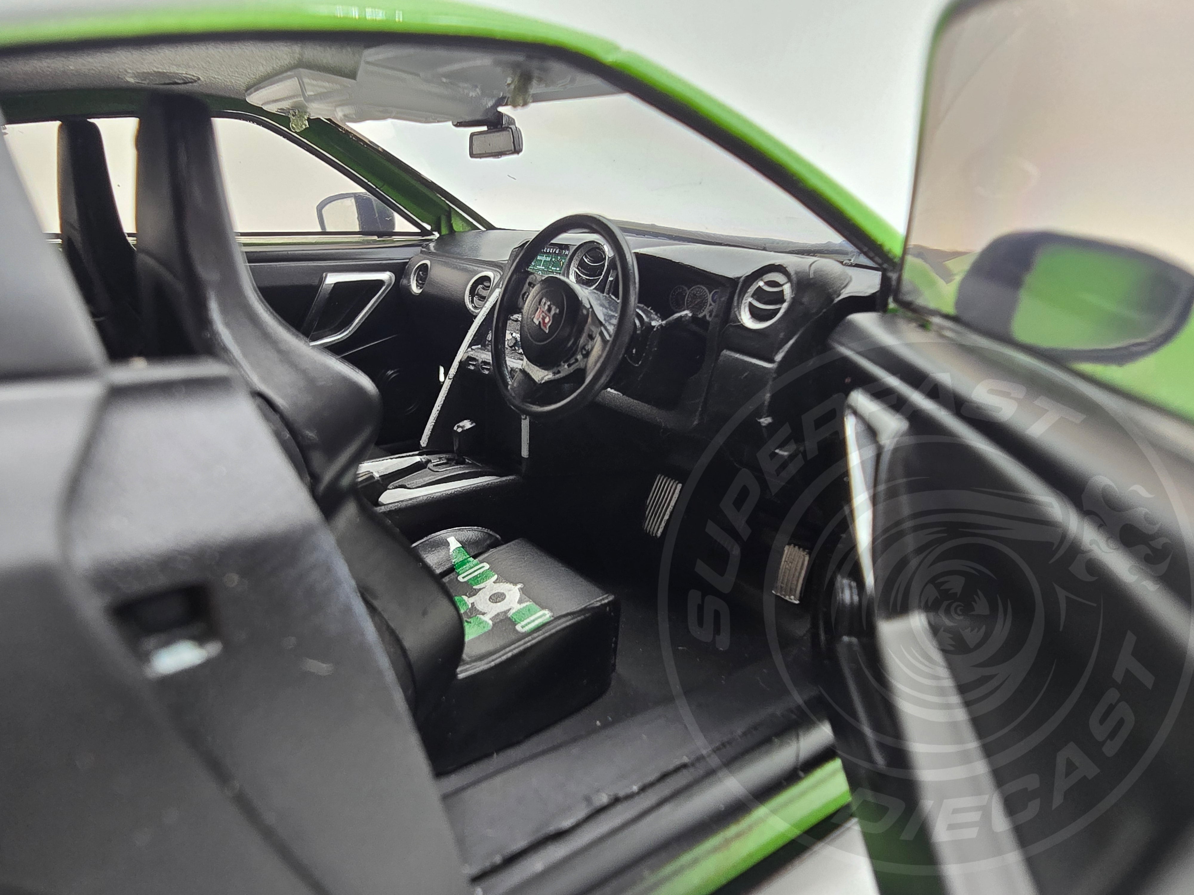 Jada 1:18 Scale Diecast - Pink Slips - Nissan GT-R (R35) with Libery Walk Body Kit 2.0, Green/Black - 35724