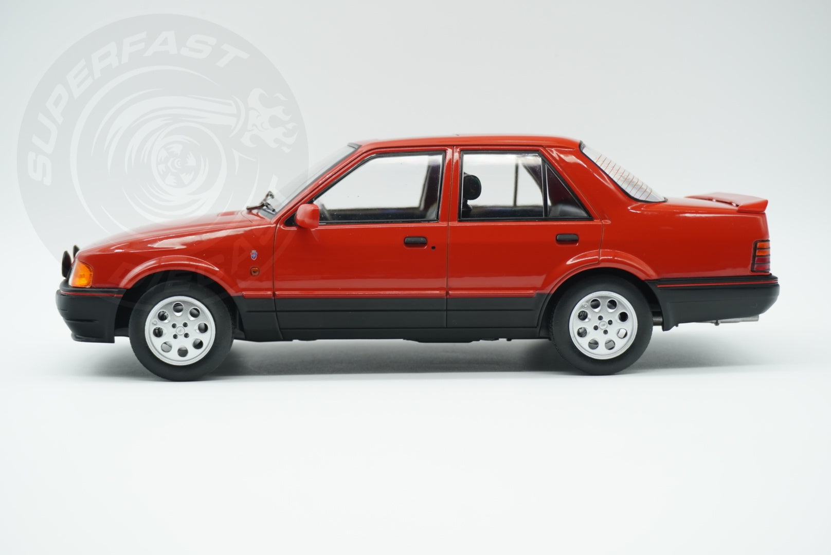 MCG 1:18 Scale Diecast - Ford Orion Mk II 1600i Ghia RHD with Pepperpot Alloys, Red (UK Exclusive 500pcs) - MCG18647