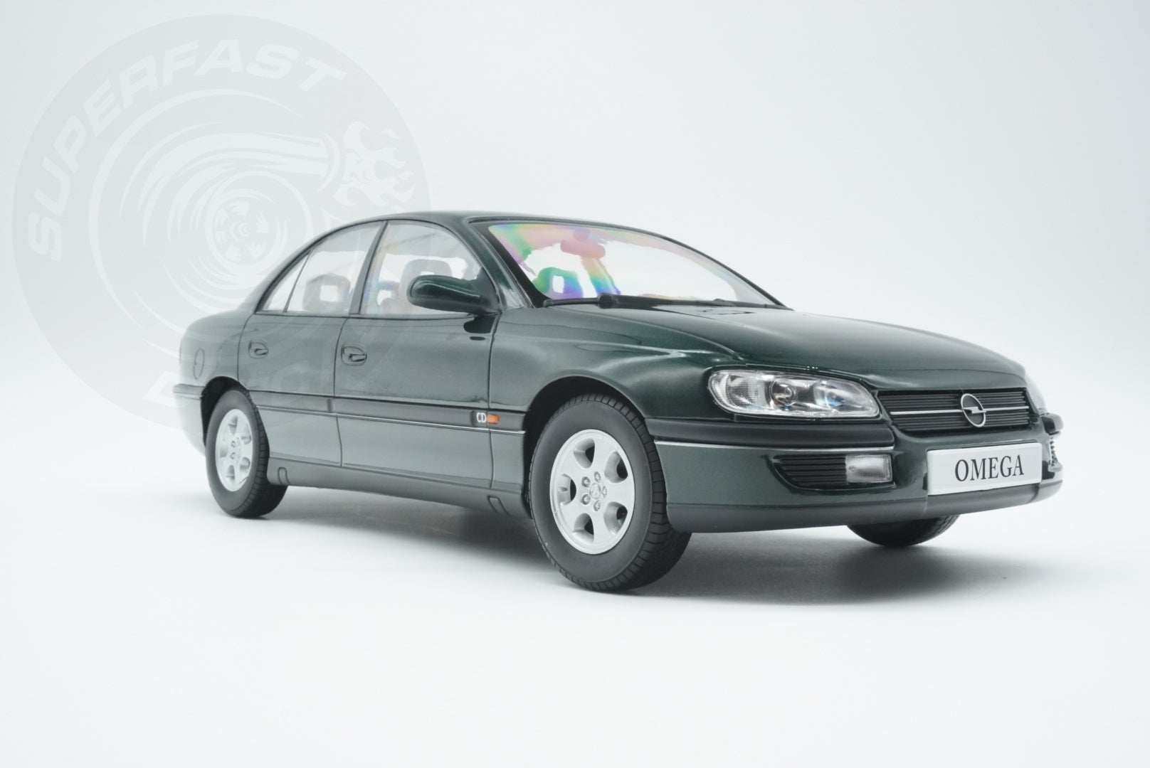 Triple 9 -  1:18 Scale Diecast - 1996 Opel Omega B CD, Jungle Green - T9-1800433