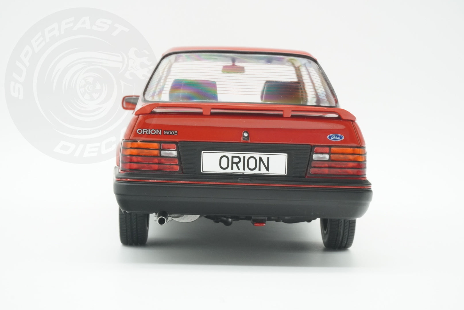 MCG 1:18 Scale Diecast - Ford Orion Mk II 1600E LHD with Multispoke Alloys, Red - MCG18488