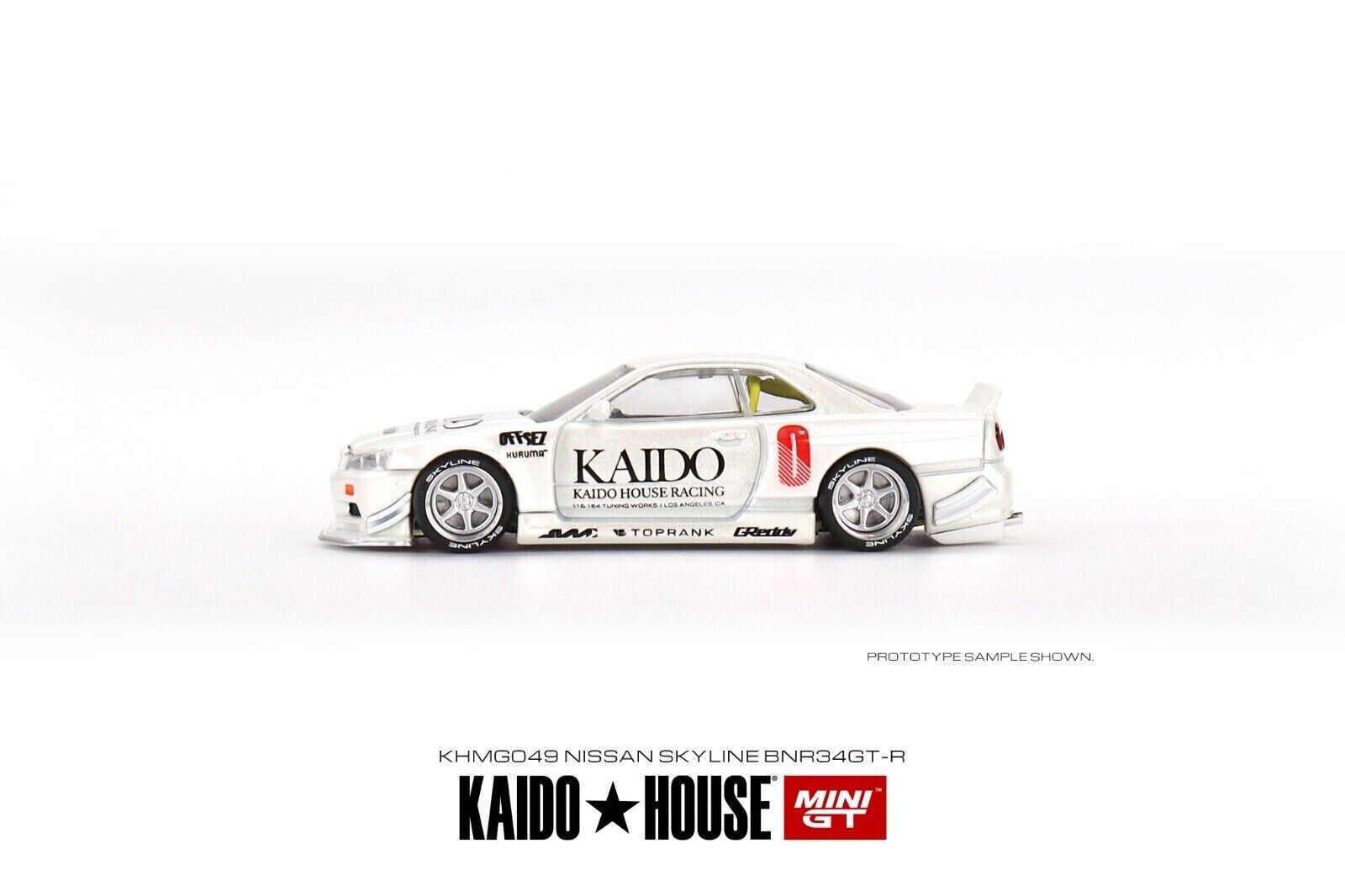 Mini Gt Kaido House 1:64 Nissan Skyline GT-R (R34) Kaido Works V1 White - KHMG049