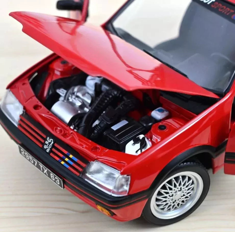 NoRev 1:18 Scale Diecast Model Car, 1991 Peugeot 205 1.9 GTi with PTS Alloy Wheels, Red - 184846